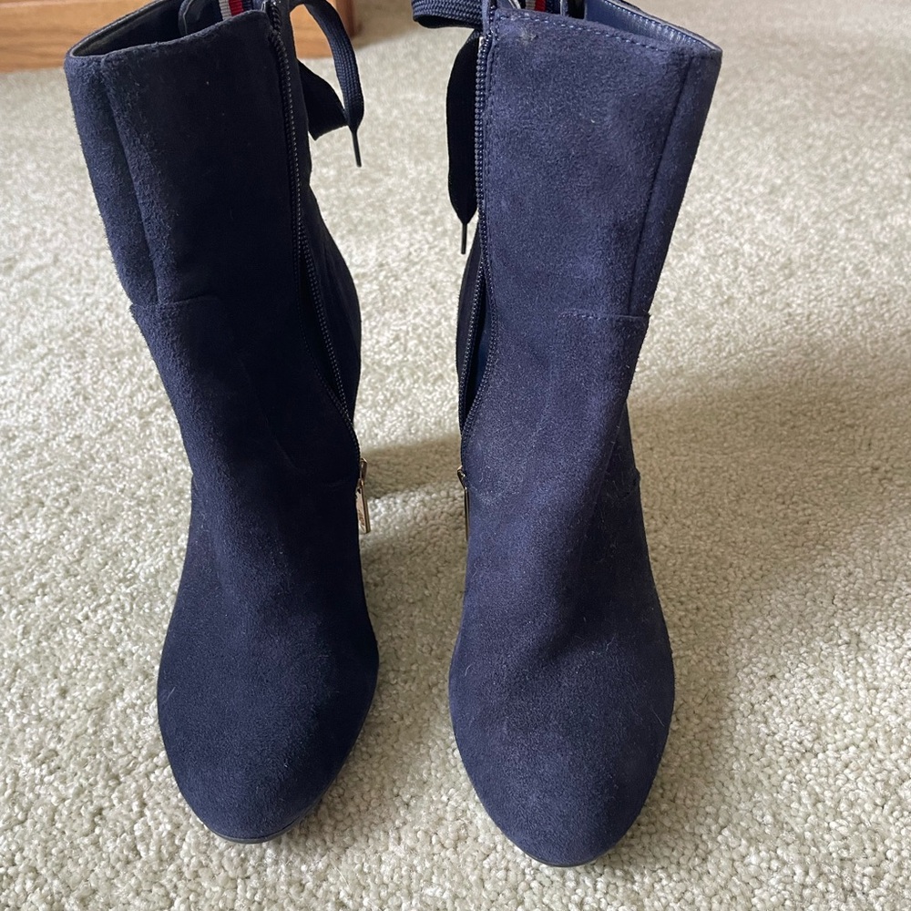 Woman’s blue suede shoes